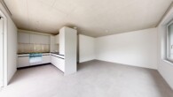 Küche/Wohnzimmer - Erstvermietung “Zur Schürwies” in Zürich – am Fusse des Uetlibergs