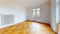 Wohnzimmer - Renovierte 3-Zimmerwohnung mit stilvollem Jugendstil-Charme