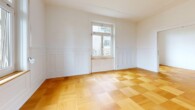 Wohnzimmer - Renovierte 3-Zimmerwohnung mit stilvollem Jugendstil-Charme