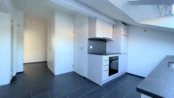 Küche - Dachwohnung mit Blick auf den Zürichsee – saniert im Jahr 2023