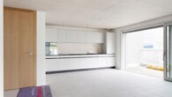 Küche/Wohnzimmer - Erstvermietung “Zur Schürwies” in Zürich – am Fusse des Uetlibergs