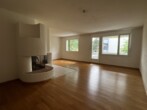 Wohnzimmer - Ihr neues Zuhause in Embrach – helle 4 1/2-Zimmerwohnung mit Cheminée