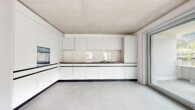 Küche/Wohnzimmer - Erstvermietung “Zur Schürwies” in Zürich – am Fusse des Uetlibergs
