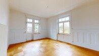 Wohnzimmer - Renovierte Jugendstilwohnung an zentraler Lage